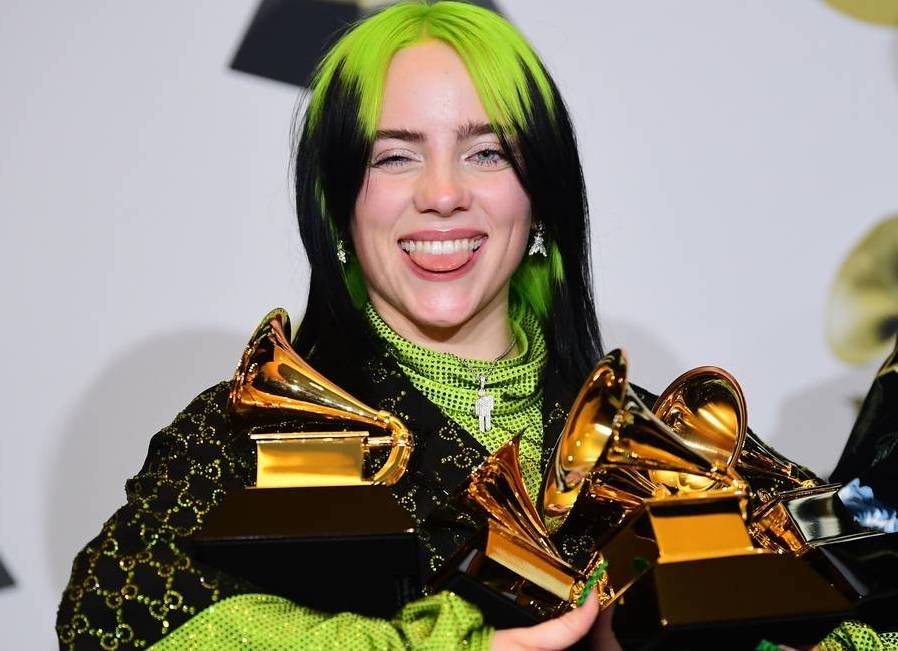 X86714345 Us Singer Songwriter Billie Eilish Poses In The Press Room With The Awards For Album Of The.jpg.pagespeed.ic.4n8gorooy4